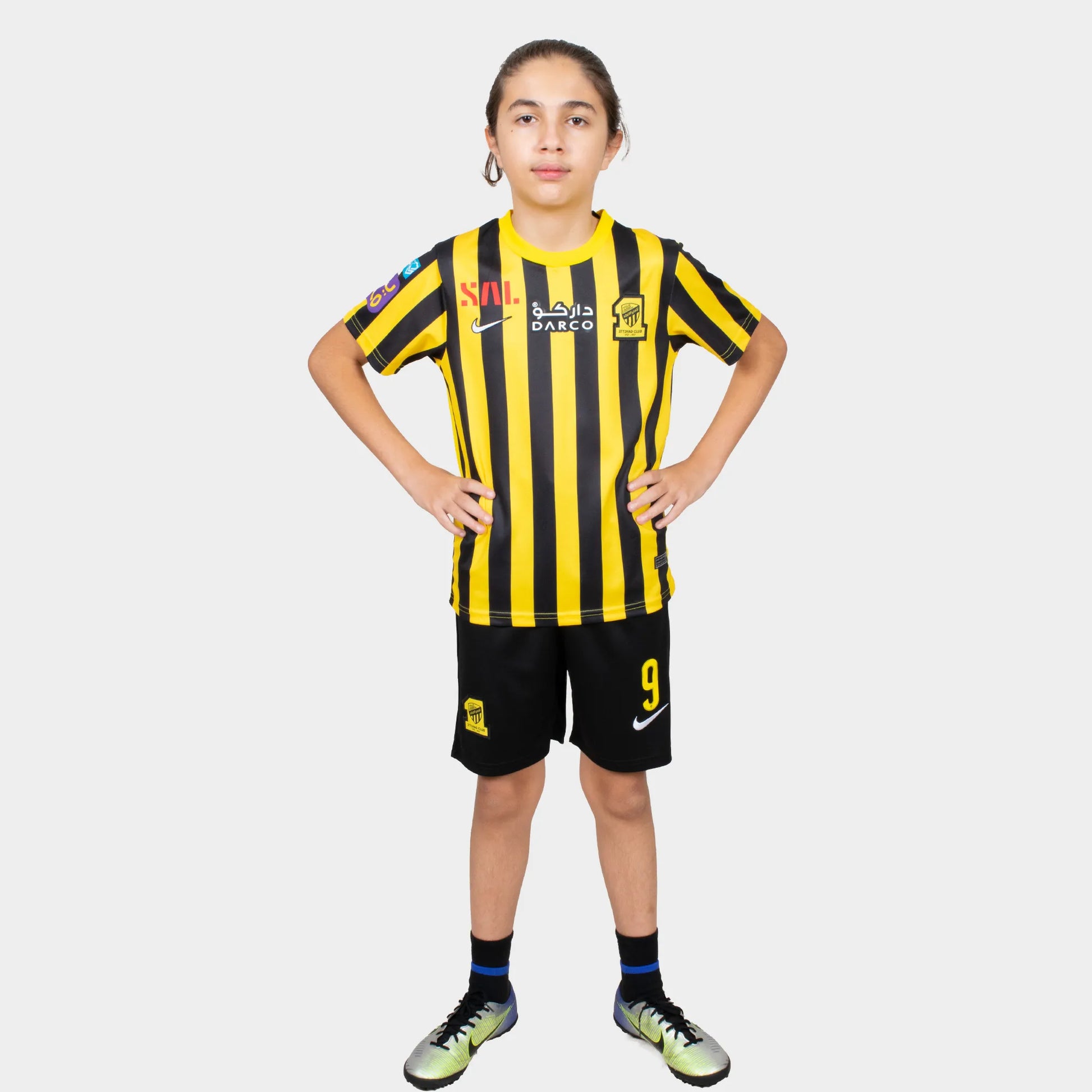 Al Ittihad Fc Kids Kit Home Season 23/24 Designed By Mitani Store , Regular Fit Jersey Short Sleeves And Round Neck Collar In Yellow Color