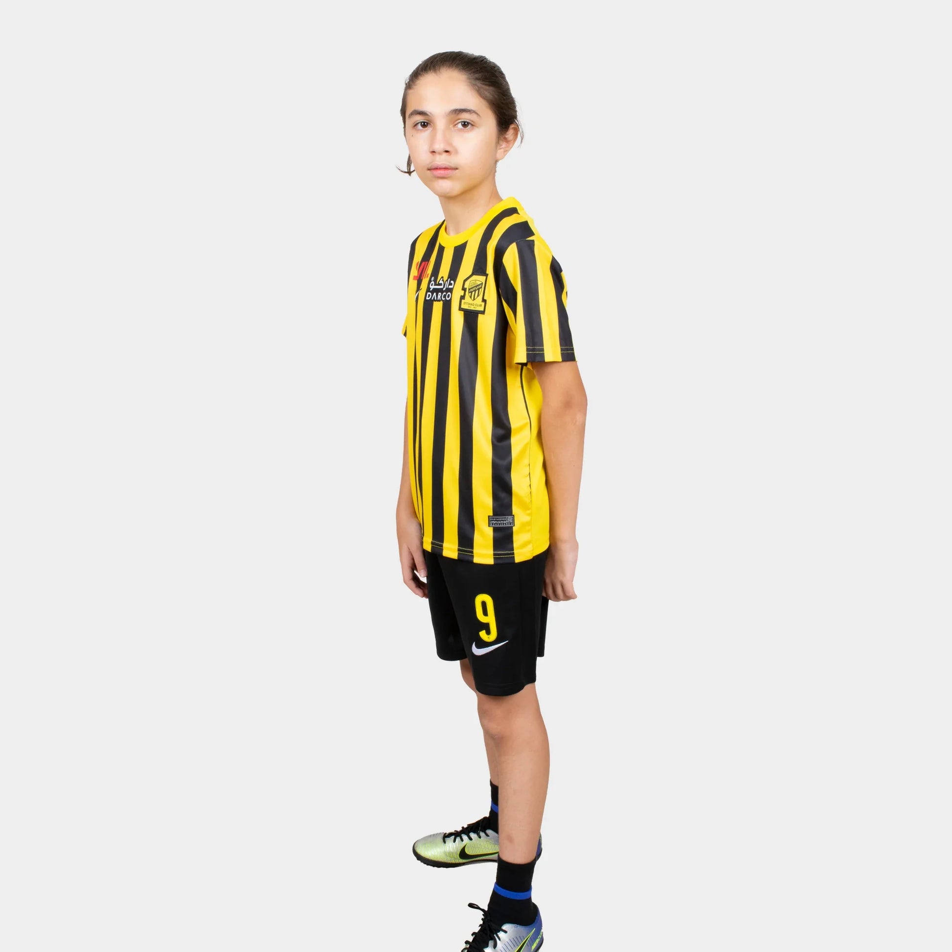 Al Ittihad Fc Kids Kit Home Season 23/24 Designed By Mitani Store , Regular Fit Jersey Short Sleeves And Round Neck Collar In Yellow Color