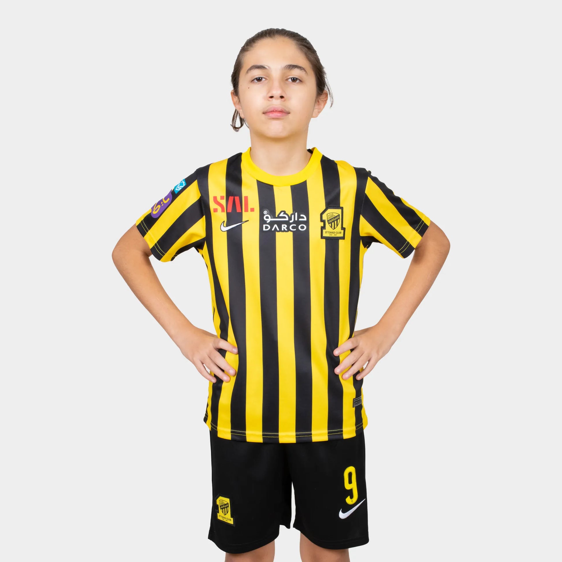 Al Ittihad Fc Kids Kit Home Season 23/24 Designed By Mitani Store , Regular Fit Jersey Short Sleeves And Round Neck Collar In Yellow Color