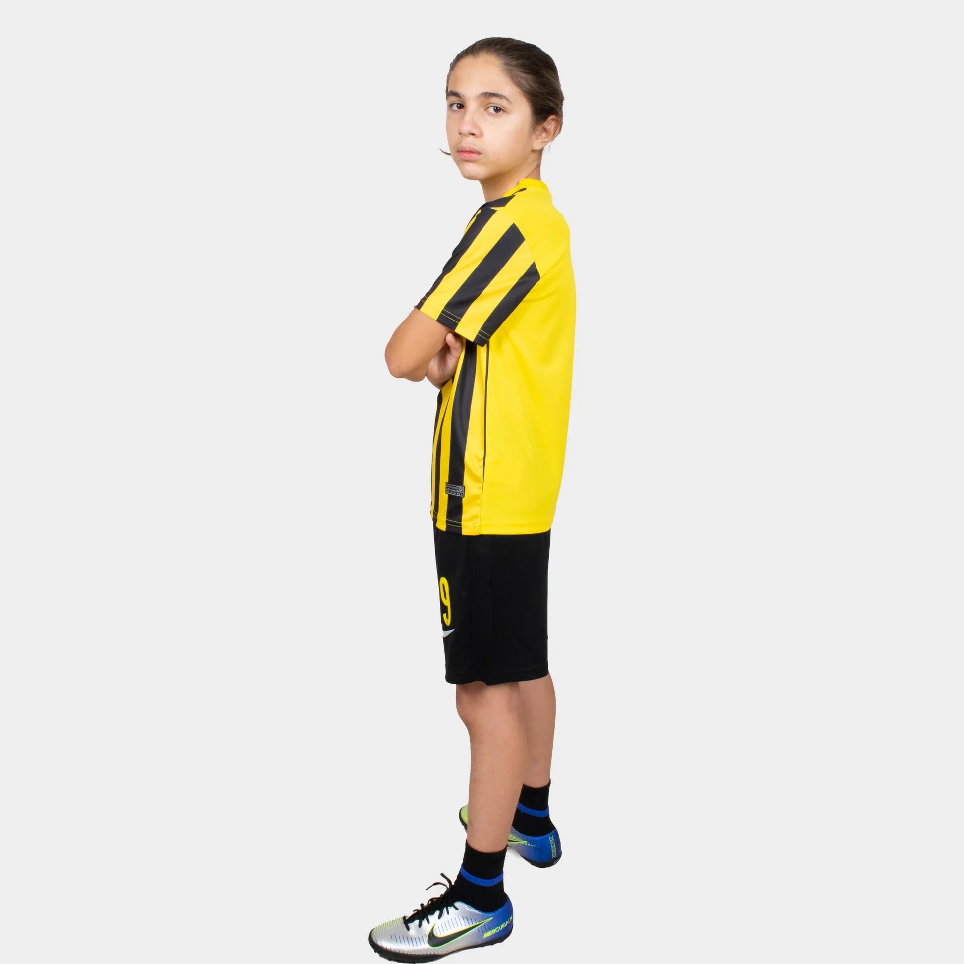 Al Ittihad Fc Kids Kit Home Season 23/24 Designed By Mitani Store , Regular Fit Jersey Short Sleeves And Round Neck Collar In Yellow Color