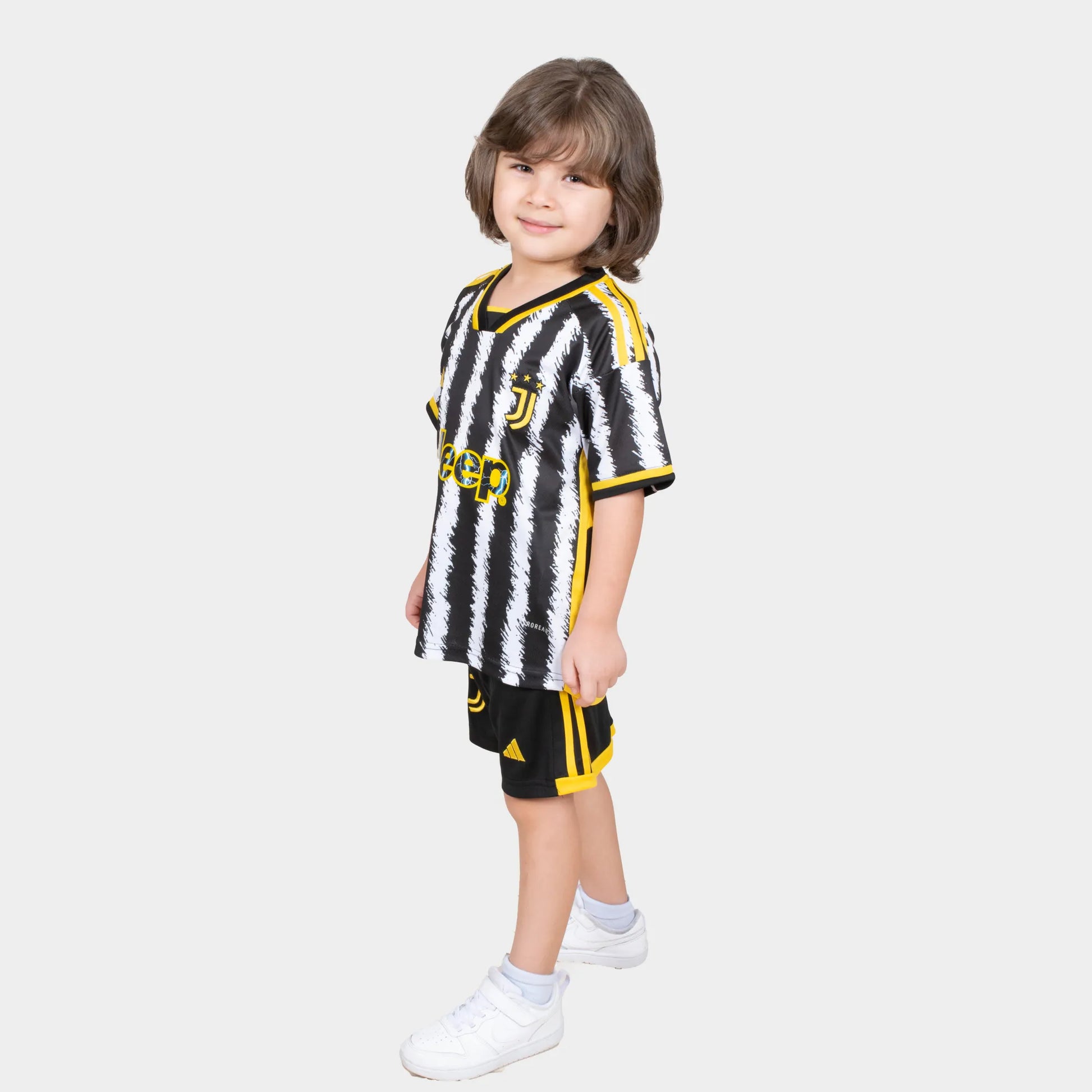 Juventus Kids Kit Home Season 23/24 Designed By Mitani Store , Regular Fit Jersey Short Sleeves And V-Neck Collar In Black and white Color